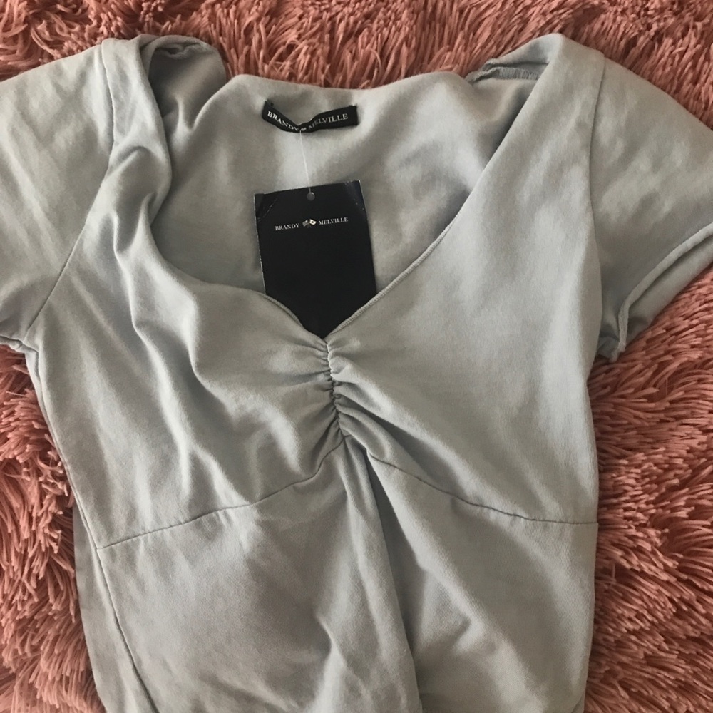 A blue scrunchy brandy top